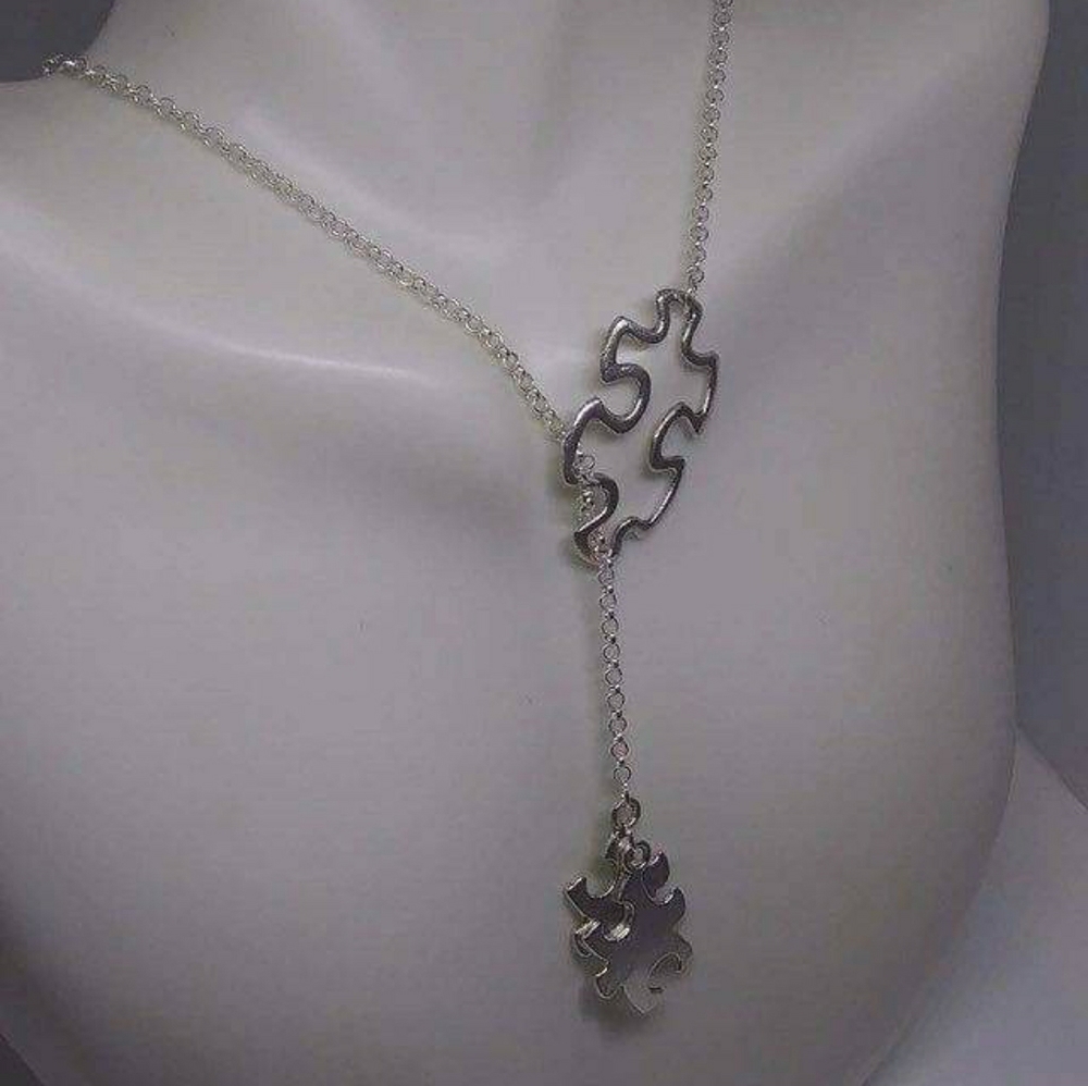 Puzzle charm necklace